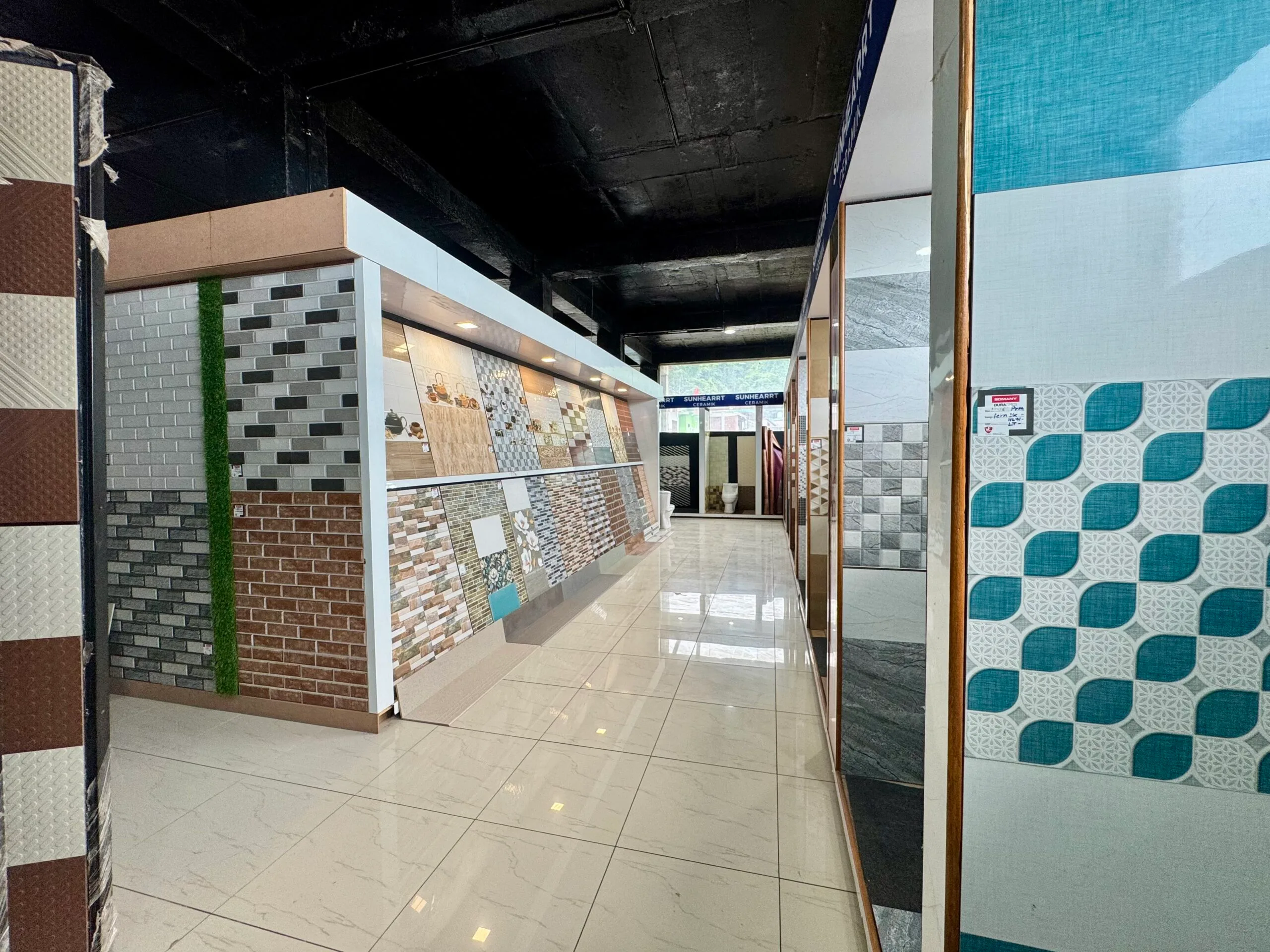 Showroom display of decorative wall tiles.